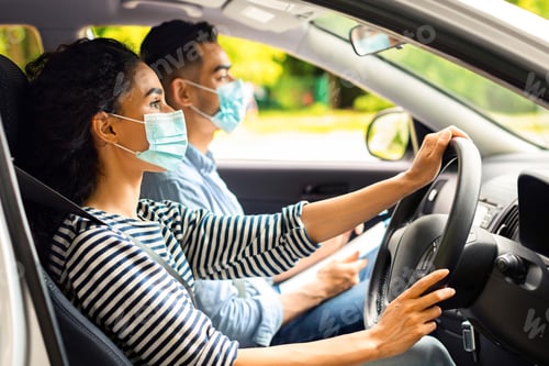 Preview: Young lady attending driving school during COVID-19 pandemic