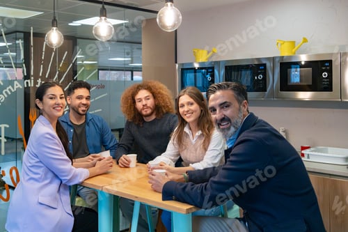 Preview: Team enjoys a coffee break together.