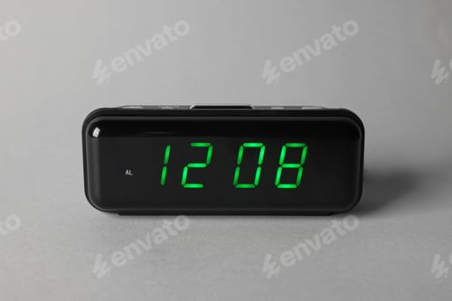 Preview: Digital alarm clock showing 12:08 o'clock on grey background