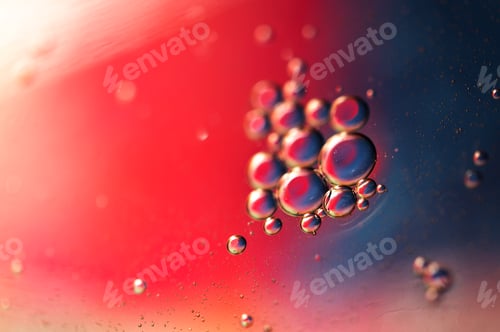 Preview: Oil in water, abstract background in blue and red color tones