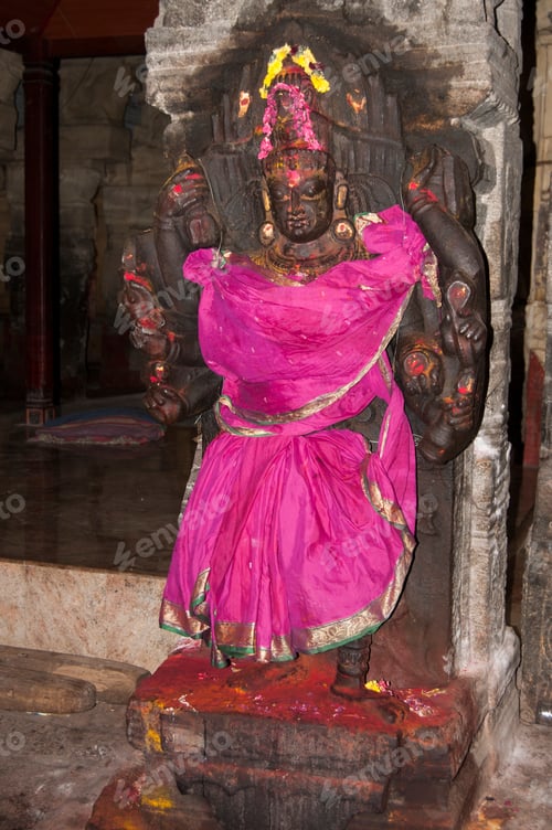 Preview: Spiritual stone statue of hindu god in ancient temple, India.