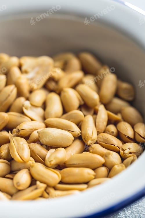 Preview: Roasted peeled peanuts in bowl.