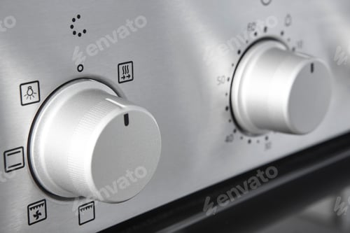 Preview: Oven cooking temperature control knob. Kitchen equipment panel detail. Stove