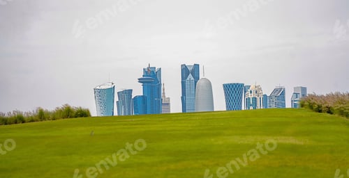Preview: Doha skyline. Greenery. Landmark. Travel. Qatar. Urban. Summer. Building’s exterior. Park.