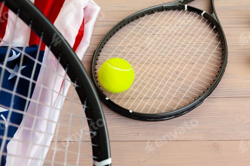 Preview: Tennis equipment on wooden surface close up