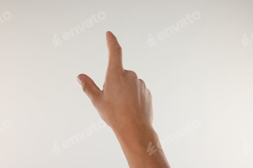 Preview: Man touching something on light grey background, closeup