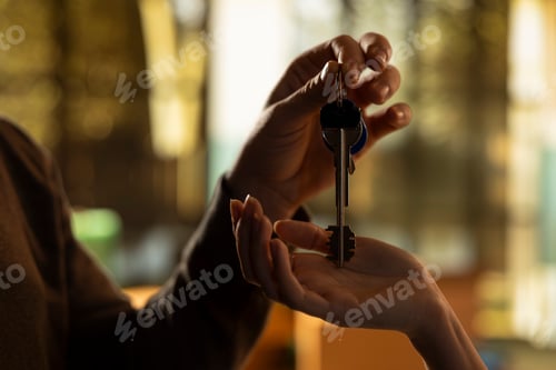 Preview: New house keys, proud homeowners, after property purchase, ownership achievement