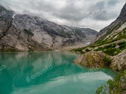 Preview: Nigardsbreen glacier and turquoise lake, Norway.