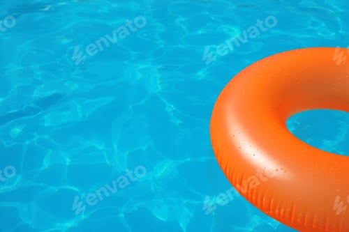Preview: Inflatable ring floating in swimming pool on sunny day. Space for text