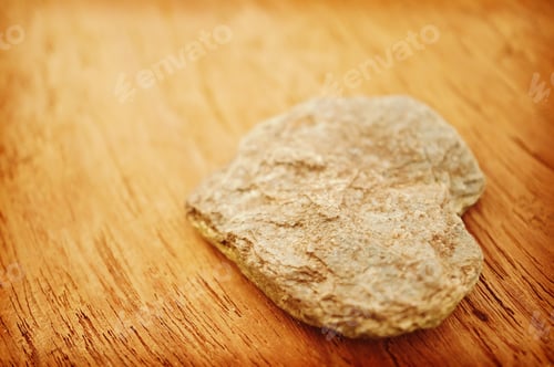 Preview: Stone In Heart Shape On The Wood Background