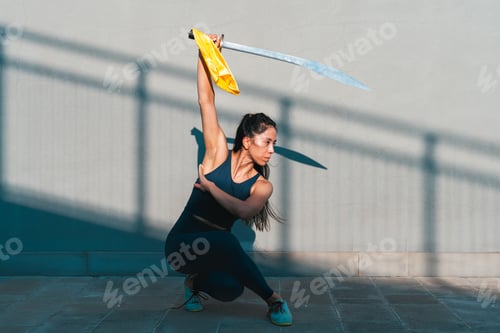Preview: Chinese young woman practicing wushu kung fu.
