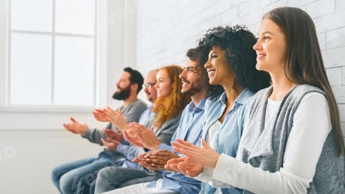 Preview: Happy People Sitting In Row Applauding To Mentor At Group Therapy