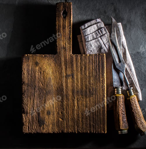 Preview: Cooking background. Vintage cutting board and cutlery