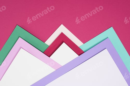 Preview: colored different triangles isolated on burgundy