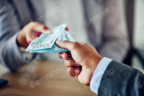Preview: Hands of a businessman, exchanging money for a service, contract or purchase agreement. Closeup of