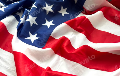 Preview: Close up of ruffled American flag. Satin texture curved flag of USA. Memorial Day or 4th of July