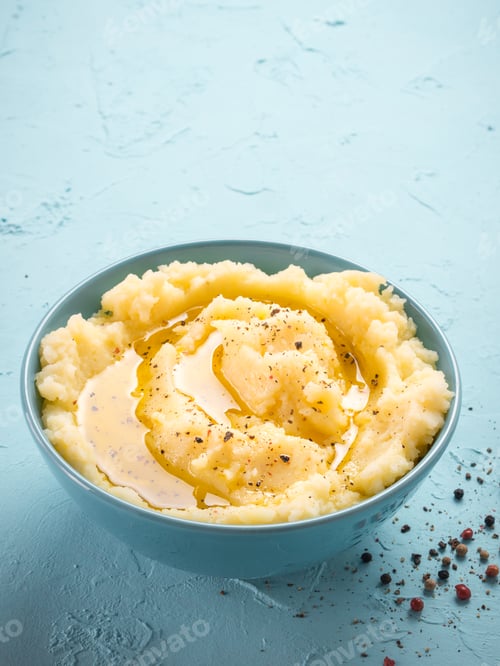 Preview: Mashed potatoes on blue concrete background