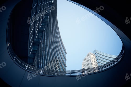 Preview: Low angle shot of modern curtain wall business buildings shot from underground passage during day