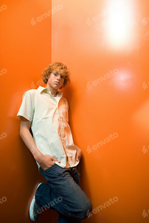 Preview: Teenage boy standing alone