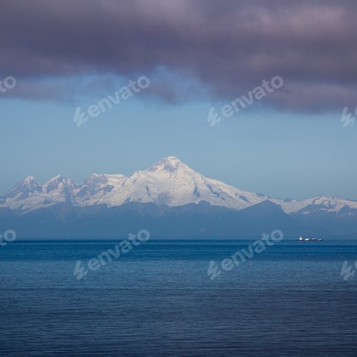 Preview: Vertical shot of the Mount Iliamna viewed from the Gulf of Alaska, USA