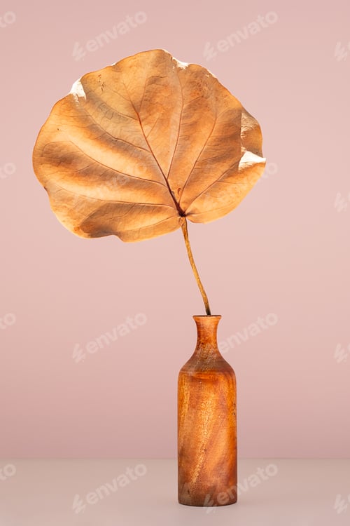 Preview: Autumn leaf in wood vase. Original autumnal composition.