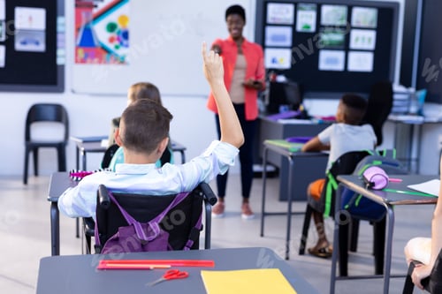 Preview: Enthusiastic Student Raising Hand in Classroom Setting
