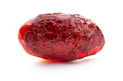 Preview: Natural amber. A piece of yellow opaque natural amber on white background