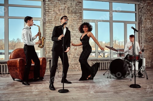 Preview: Musical concept. Rehearsal of the performance of the musical group. Emotional musicians light up at