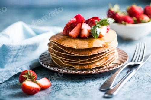 Vista previa: A stack of pancakes with maple syrup
