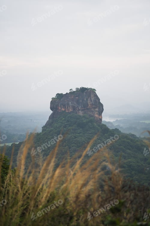Preview: Hazy and moody morning photo of Sigiriya Lion Rock from Pidarangula Rock