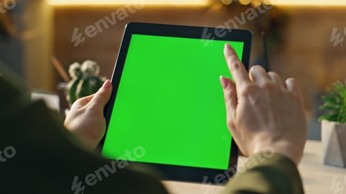 Preview: Mockup tablet worker scrolling display browsing social media at office close up.