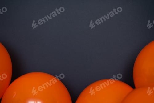 Preview: simple orange balloons on black background