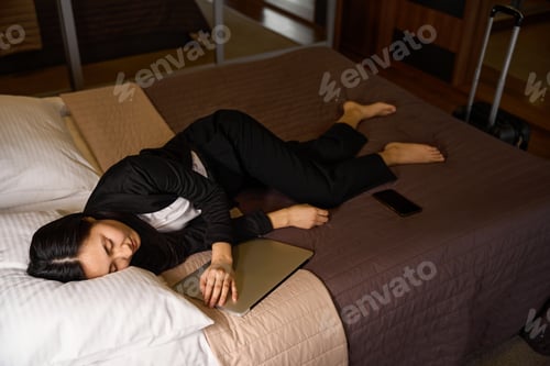 Preview: Exhausted woman worked on speech till late and fall asleep in suit