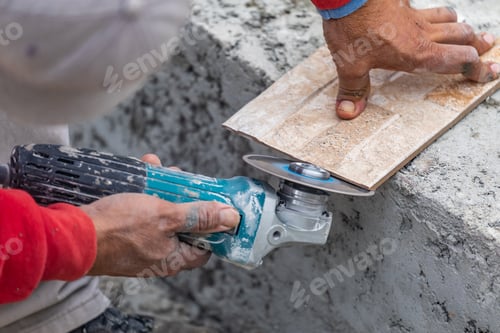 Preview: Worker Grinding Corner Tile for Fitting