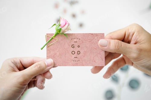 Preview: Woman holding a card