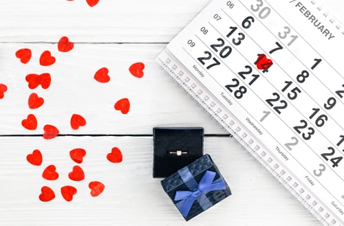 Preview: Valentine's Day background, date February 14 on calendar, flat lay, top view.
