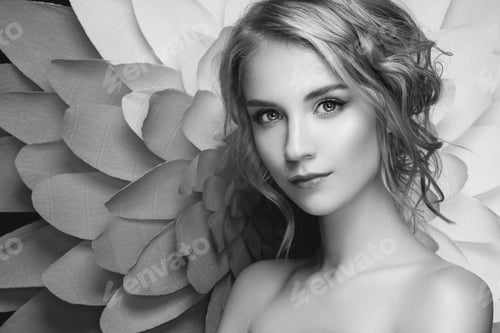 Preview: Beautiful woman on the background of a large flower