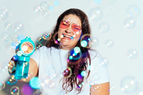 Preview: Plus size woman model posing in studio and having fun