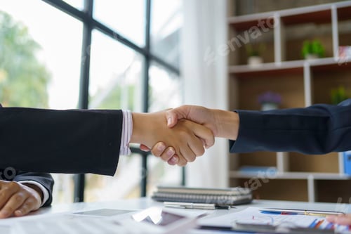 Preview: A group of Asian business people handshake to make a contract business agreement to start a new busi