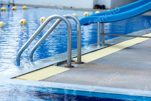 Preview: Ladder stainless handrails for descent into swimming pool.