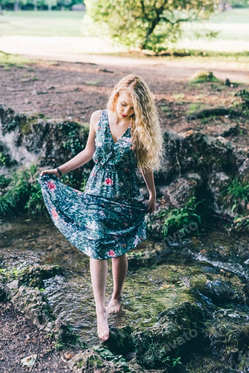 Preview: Young woman outdoor park