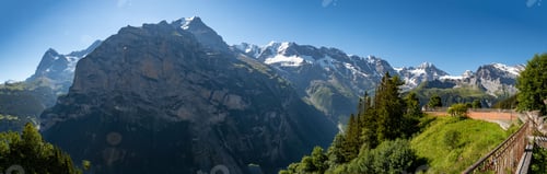 Preview: Panoramic shot of the landscape with mountains on a sunny day