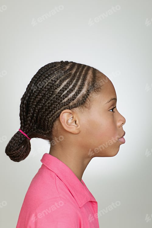 Preview: Profile of girl with braided hair