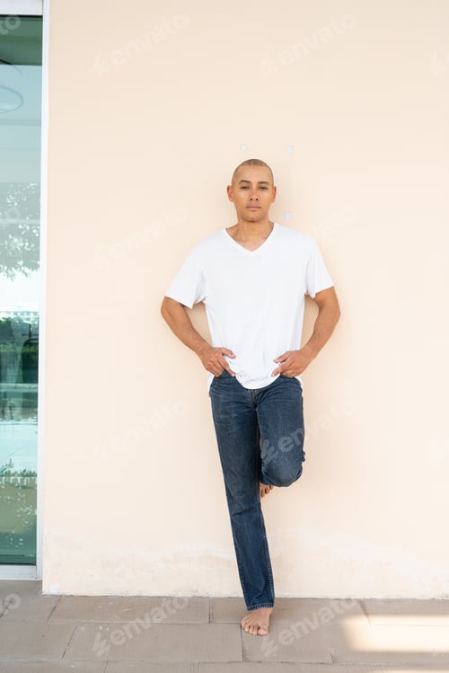 Preview: Portrait of handsome bald man wearing t-shirt