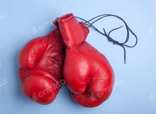 Preview: red boxing gloves isolated on blue background