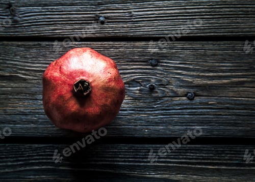 Preview: pomegranate on a wooden rustic background. fruit, food, look for useful