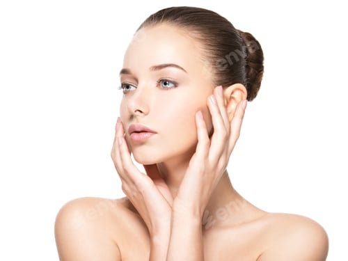 Preview: Young woman with healthy clean skin touches the face. Skin care concept.
