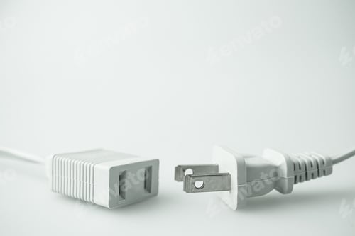 Disconnected Plugs on a White Background