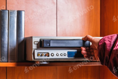 Preview: retro vhs tape player, wearing a jacket in the style of the 90s,