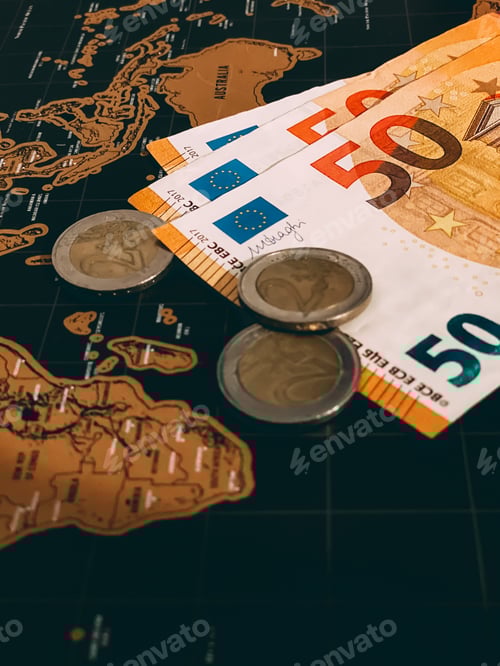 Preview: Money cash savings for the next travel trip around the world on a black background.